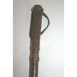 LEATHER WALKING OUT CANE - PRINCE OF WALES a leather cane with a Prince of Wales crest. 60cms long