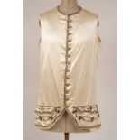 AN C18TH GEORGIAN SATIN WAISTCOAT A circa 1700's cream satin waistcoat with intricate embroidery and