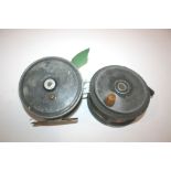 TWO SALMON FISHING REELS including a 4 1/2" reel by Fred Shaw, and a 4 1/4" reel marked York,