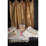 A BOX OF ANTIQUE LINEN A quantity of linen table cloths, runners, embroidered tray cloths,