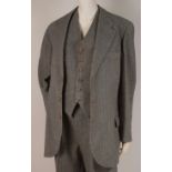 A 1960'S VINTAGE GENTLEMAN'S 3-PIECE TWEED SUIT. Black and white hounds-tooth three piece suit.