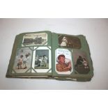 2 POSTCARD ALBUMS including greetings cards with children and animals, comic cards (McGill, Mabel