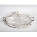 An Edward VIII silver mounted mirrored and clear glass twin handled hors d'oeuvres tray,