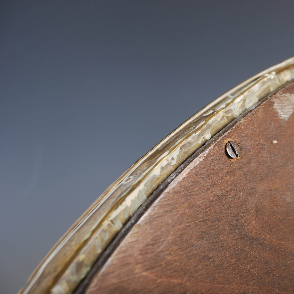 A Scottish Arts & Crafts brass wall mirror, the oval bevelled mirror plate within an embossed Celtic - Image 10 of 10