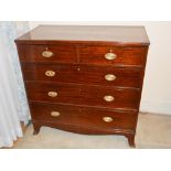 A 19th century mahogany chest, the rectangular top with reeded edge above two short and three long