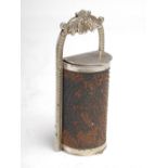 A Victorian silver-plated kitchen nutmeg grater, with shell and foliate handle and two hinged D-