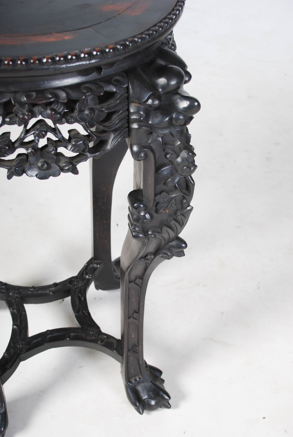 A Chinese dark wood jardiniere stand, Qing Dynasty, the circular panelled top above a pierced and - Image 3 of 5