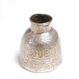 A 19th century Middle Eastern white metal water pot/ brush washer, richly chased with panels of