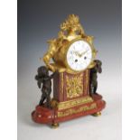 A late 19th century French ormolu, marble and bronze mounted mantle clock, the dial signed Maple &