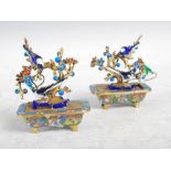 A pair of Chinese cloisonne, ormolu and enamel miniature trees, late 19th/ early 20th century, the