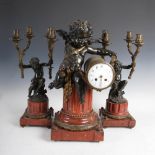 An impressive late 19th century French bronze and marble clock garniture, the clock with a white