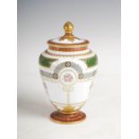 A late 19th/ early 20th century hand painted opaline glass jar and cover, decorated with three