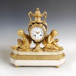 A late 19th century French ormolu, marble and cobalt blue porcelain mounted mantle clock, the dial