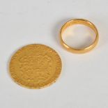 A George III gold Guinea, 1785, and a 22ct gold wedding ring, gross weight 12.5 grams, (2).