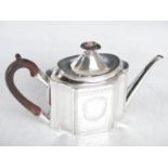 A George III silver teapot, London, 1794, makers mark of R.H, of octagonal form with bright cut