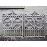 A pair of Victorian cast iron Gothic gates, cast with quatrefoil panels enclosing projecting