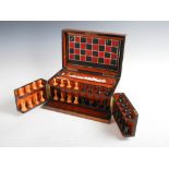 A late 19th century mahogany and ebony lined games compendium, with detachable game board, dominoes,