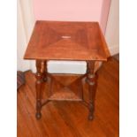 An oak occasional table reputedly made from the floor of the old Scottish Parliament House, the