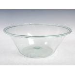 A 19th century blown glass separating bowl, of tapered cylindrical form with folded rim and small