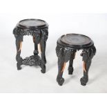 Two late 19th century ebonised elephant form occasional tables, (2), the larger 32cm diameter x 58cm