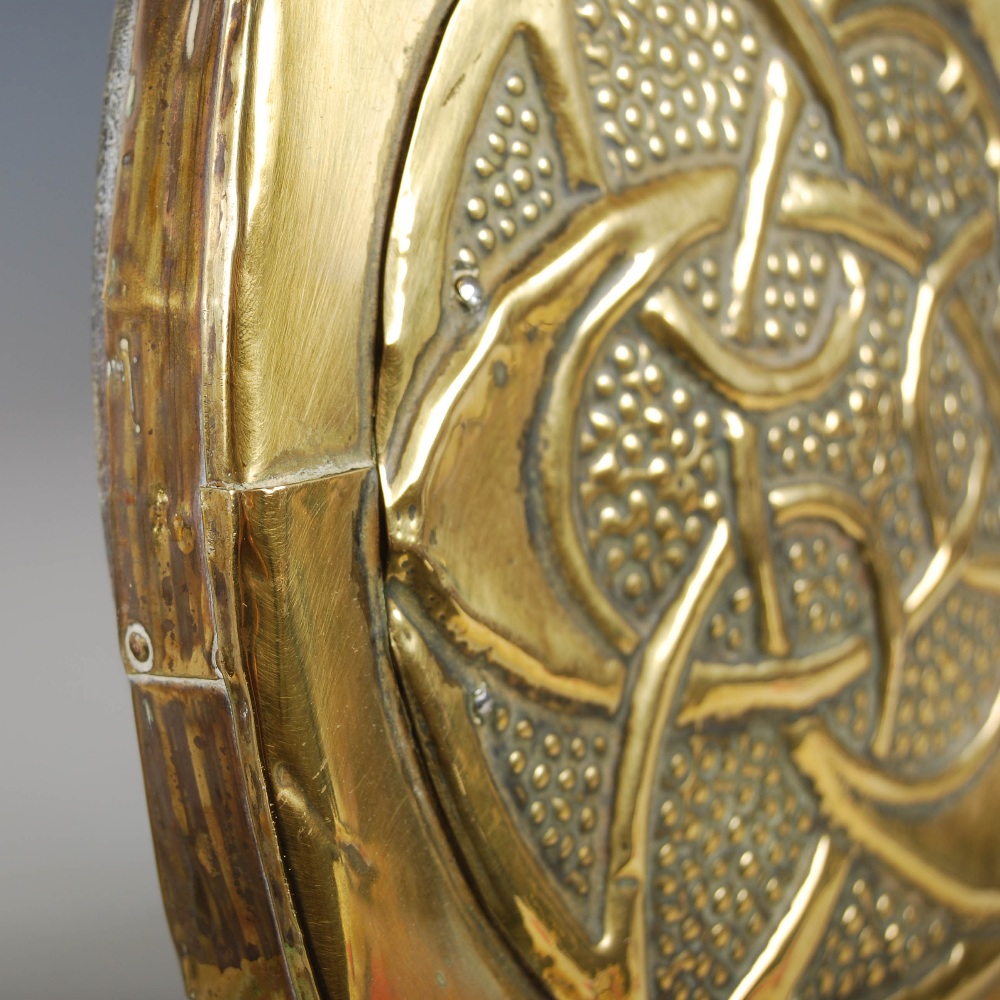 A Scottish Arts & Crafts brass wall mirror, the oval bevelled mirror plate within an embossed Celtic - Image 6 of 10