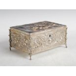 A Continental silver casket, the hinged cover with embossed decoration of a Cavalier, the sides with