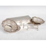 A collection of silver, to include; a George V silver engine turned Art Deco style cigarette box,