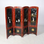 A late 19th century Japanese lacquer, mother of pearl and bone inlaid four fold screen, decorated