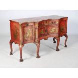 A late 19th/ early 20th century red lacquer chinoiserie style serpentine sideboard, the shaped top