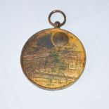 A 19th century gilt metal medal of ballooning interest, inscribed 'Souvenir De Mon Ascension Dans Le