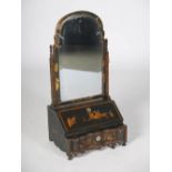 A George II green lacquered Chinoiserie decorated dressing table mirror, the arched bevelled