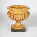 A 20th century faux marble campagna shaped urn, with lead lined interior, 68cm diameter x 71cm