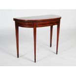 A George III mahogany and satinwood banded demi lune card table, the hinged top opening to a baize