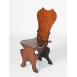 A George II style oak hall chair, of sgabello form, 95.5cm high.