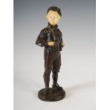 M. Lindenberg, a late 19th/ early 20th century bronze and ivory figure of a boy, with ivory face and