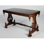 A 19th century rosewood centre table, the rounded rectangular top raised on lyre carved trestle ends