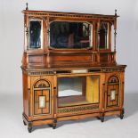 A late 19th century Aesthetic Movement walnut, ebonised and parcel gilt sideboard by LAMB,