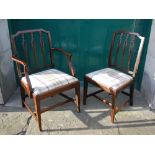 A set of six early 19th century mahogany dining chairs, comprising one carver and five side chairs