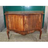 An 18th century Continental rosewood and marquetry inlaid serpentine side cabinet, possibly Danish