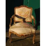 WITHDRAWN - A late 19th century gilt wood fauteuil, with foliate upholstered back, arms and seat,