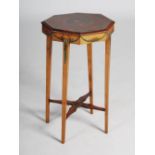 An early 20th century painted satinwood occasional table, the octagonal top decorated with a