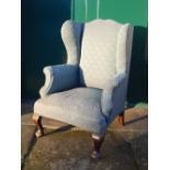 WITHDRAWN - A 19th century mahogany wing armchair,