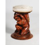 An early 20th century carved and gilded pine blackamoor revolving dressing table stool, 34cm