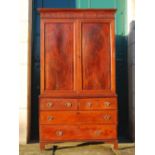 WITHDRAWN - A 19th century mahogany and boxwood lined linen press,