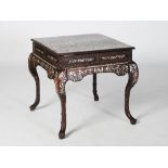 A Chinese dark wood and mother of pearl inlaid centre table, Qing Dynasty, the rectangular top