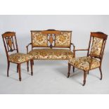 An Edwardian mahogany and marquetry inlaid parlour suite, comprising sofa, pair of armchairs and