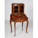 A late 19th century walnut and ormolu mounted bonheur de jour, the upright back with a pair of
