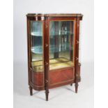 A late 19th century mahogany and gilt metal mounted display cabinet, the mottled red marble top