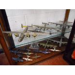 2 shelves of model aeroplanes