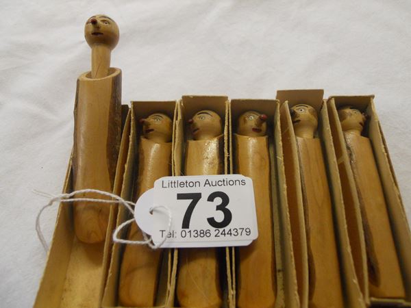 Box of carved wood cigarette holders